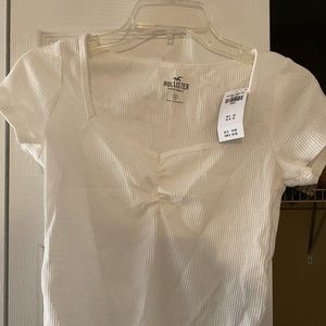 white short sleeved sweetheart top